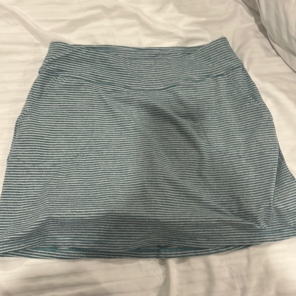 striped skort Built in spandex shorts 2pockets ifront 1 zip pocket back
